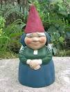 This is a picture of a gnome that is quite small. It has got a hat on and appears to be smiling. Buy Viagra. Lose weight using this secret recipie. Make $$$ working from home.